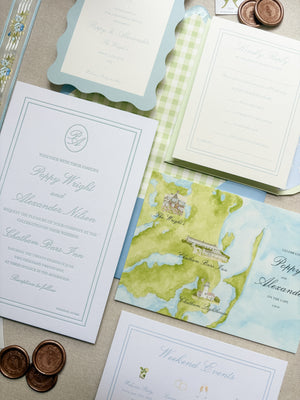 Wedding invitation set with watercolor map design for a Cape Cod coastal wedding on a textured surface