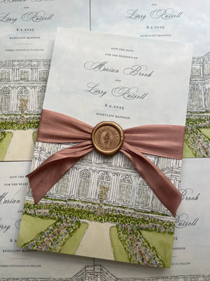 Elegant wedding invitation with a watercolor venue hand-painted on it with a pink ribbon and wax seal detail and more invitations in the background