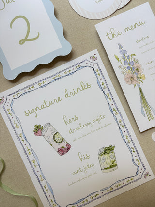 Signature drinks, menu, and table number wedding stationery for a spring wildflower wedding theme