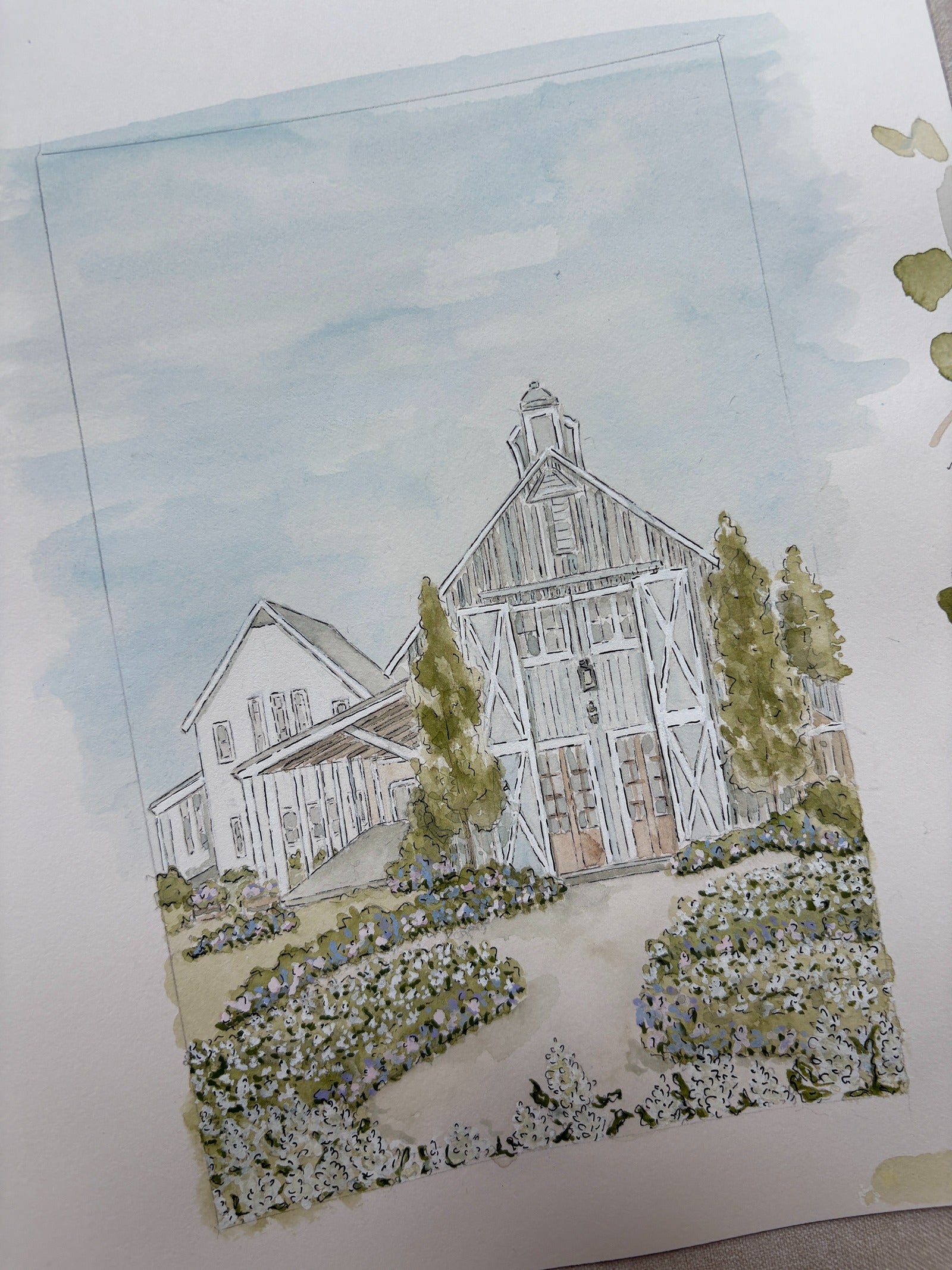 Watercolor wedding venue illustration for wedding invitation suites at a wedding barn venue with florals and greenery